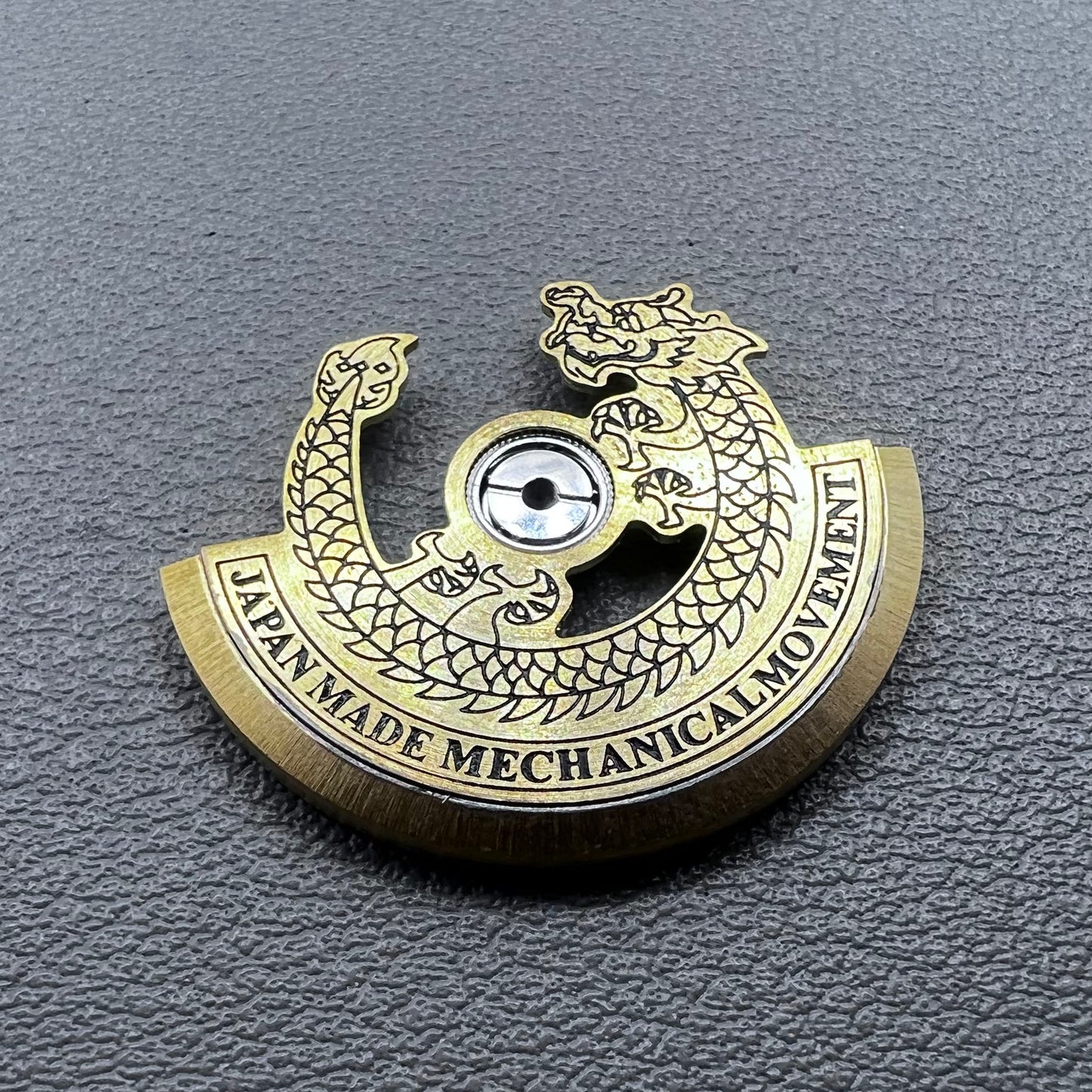 Black carved golden dragon rotor for NH35 NH36 watch movement, enhancing mechanical elegance.