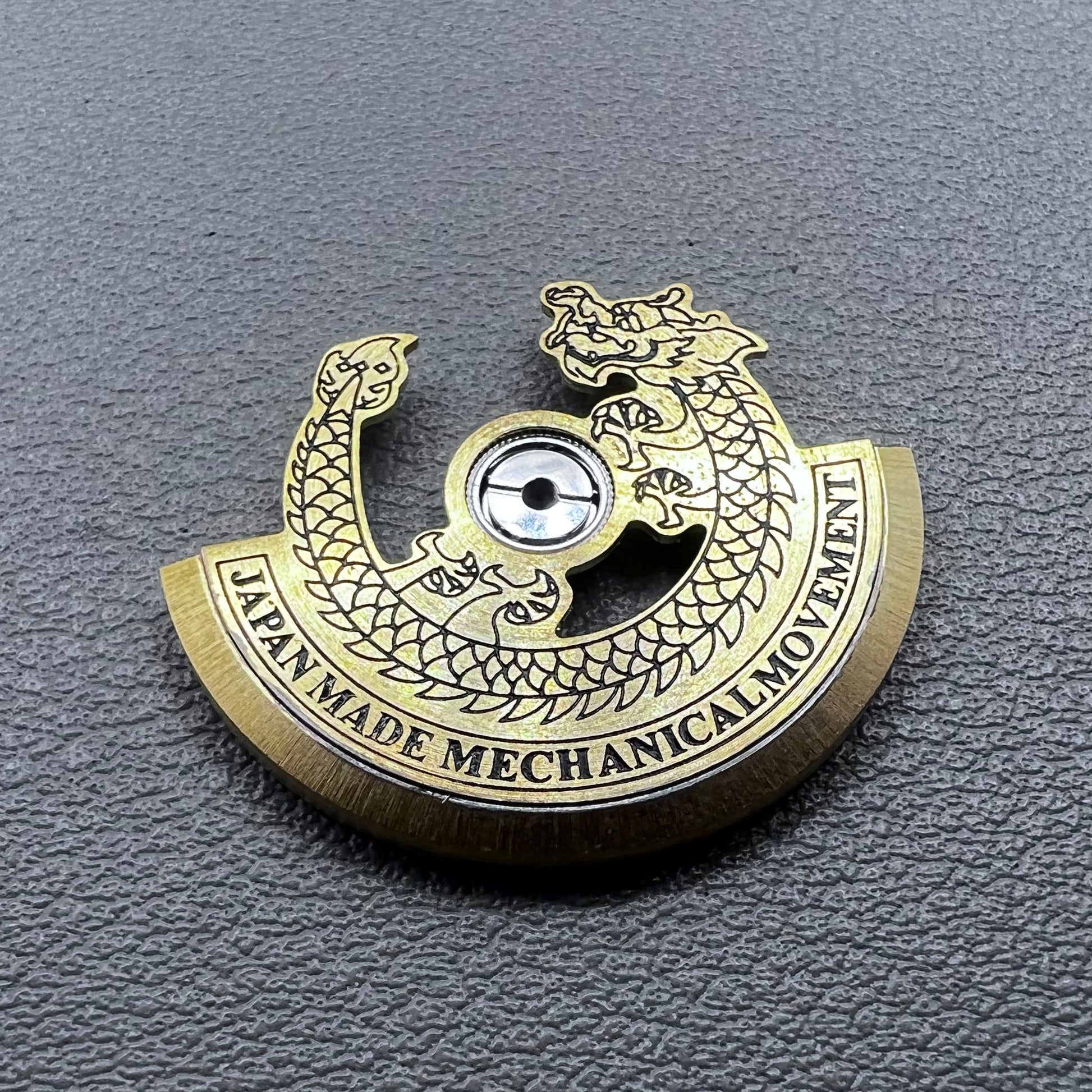 Black carved golden dragon rotor for NH35 NH36 watch movement, enhancing mechanical elegance.