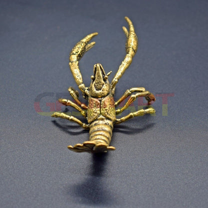 Solid copper lobster trinket with vintage bronze finish and hand-carved detail, perfect for watch accessory display.