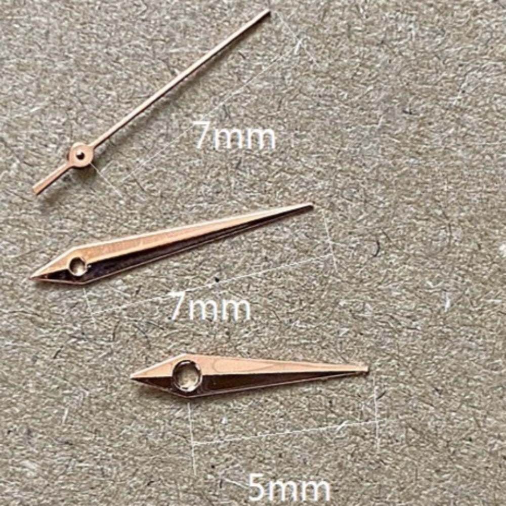 Rose golden arrow-shaped watch hands 7x7x5mm for Miyota 2035 quartz movement timepieces.