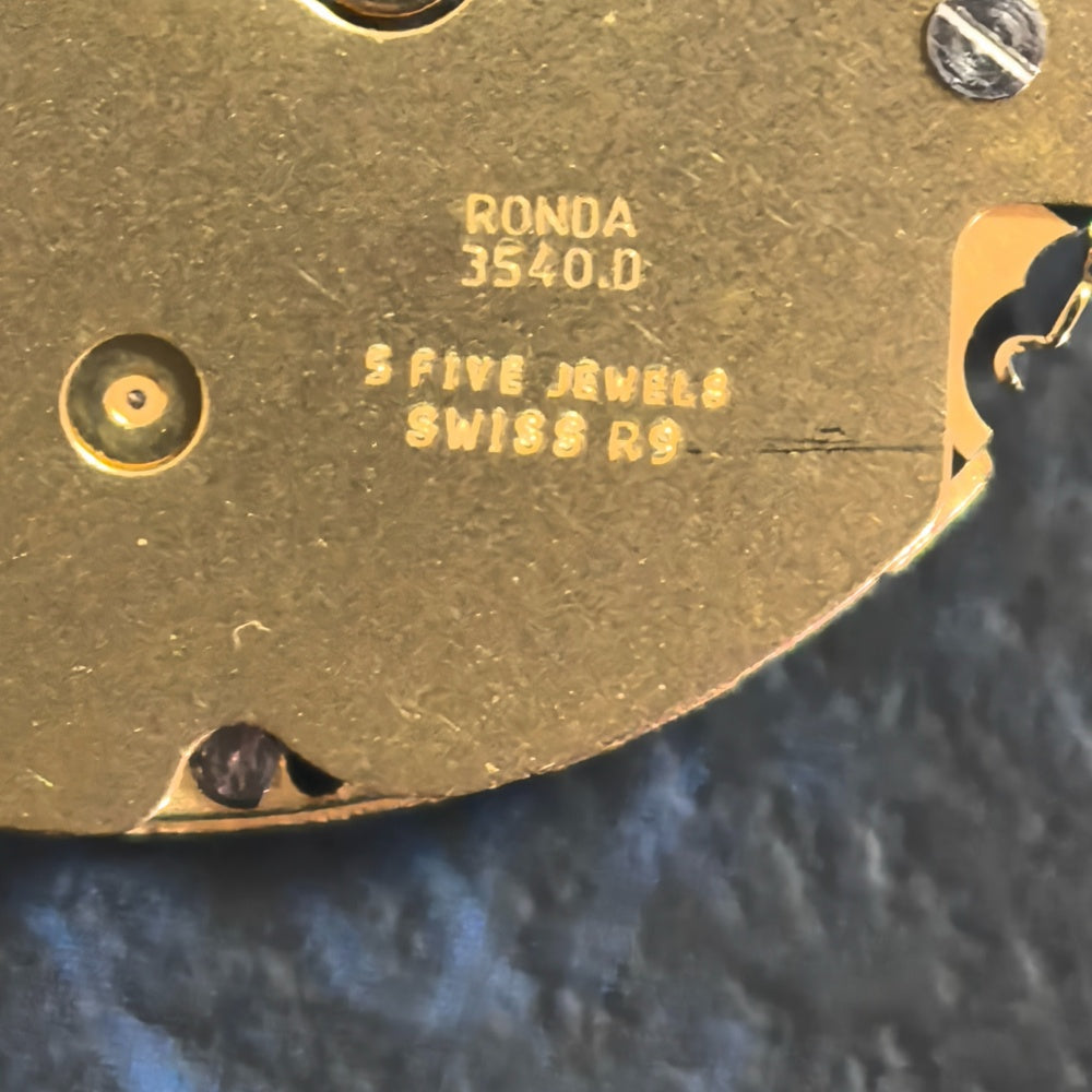 Swiss Made Ronda 3540.D quartz watch movement with multifunctional 6 hands for accurate timekeeping.