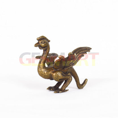 Solid copper dragon figurine, hand-carved with intricate details and polished finish.  