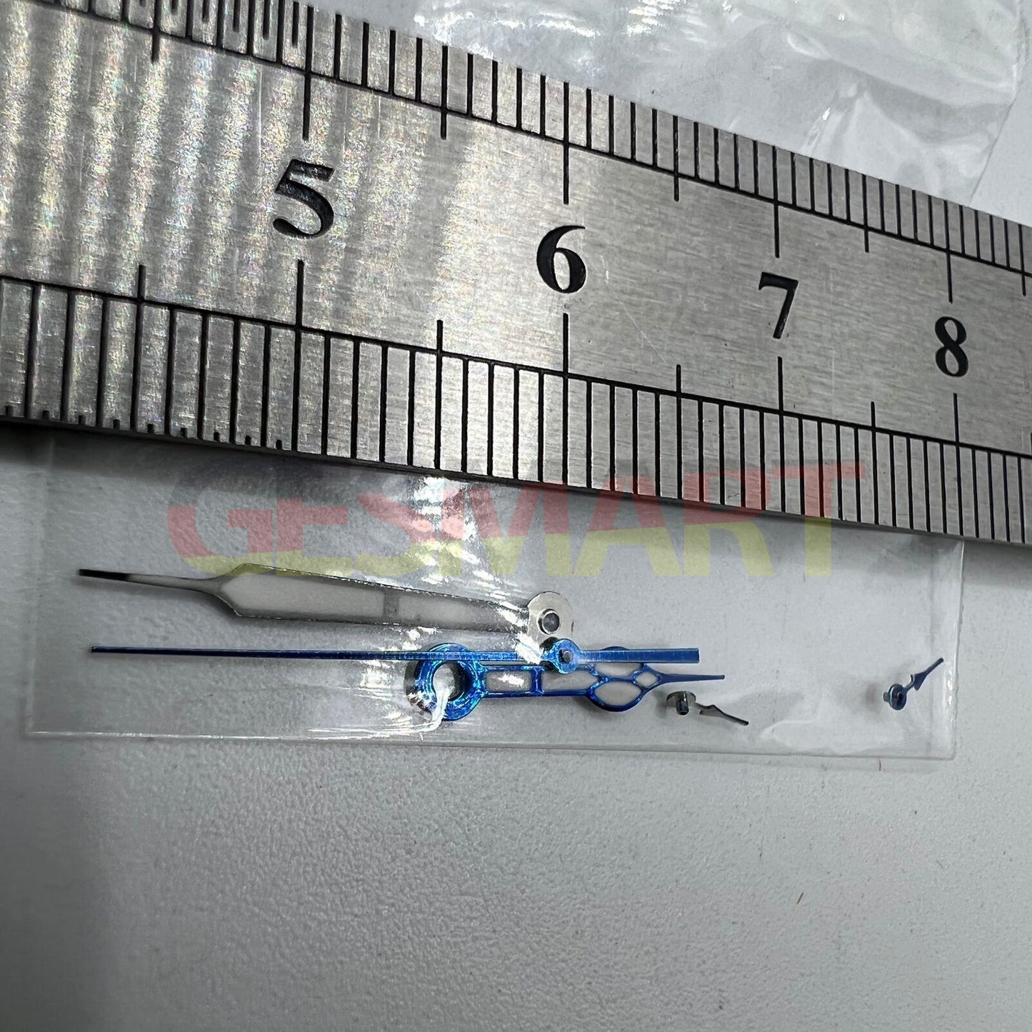 Blue-trimmed green lume watch hands by Miyota for OS10 movement, boosting visibility and style.