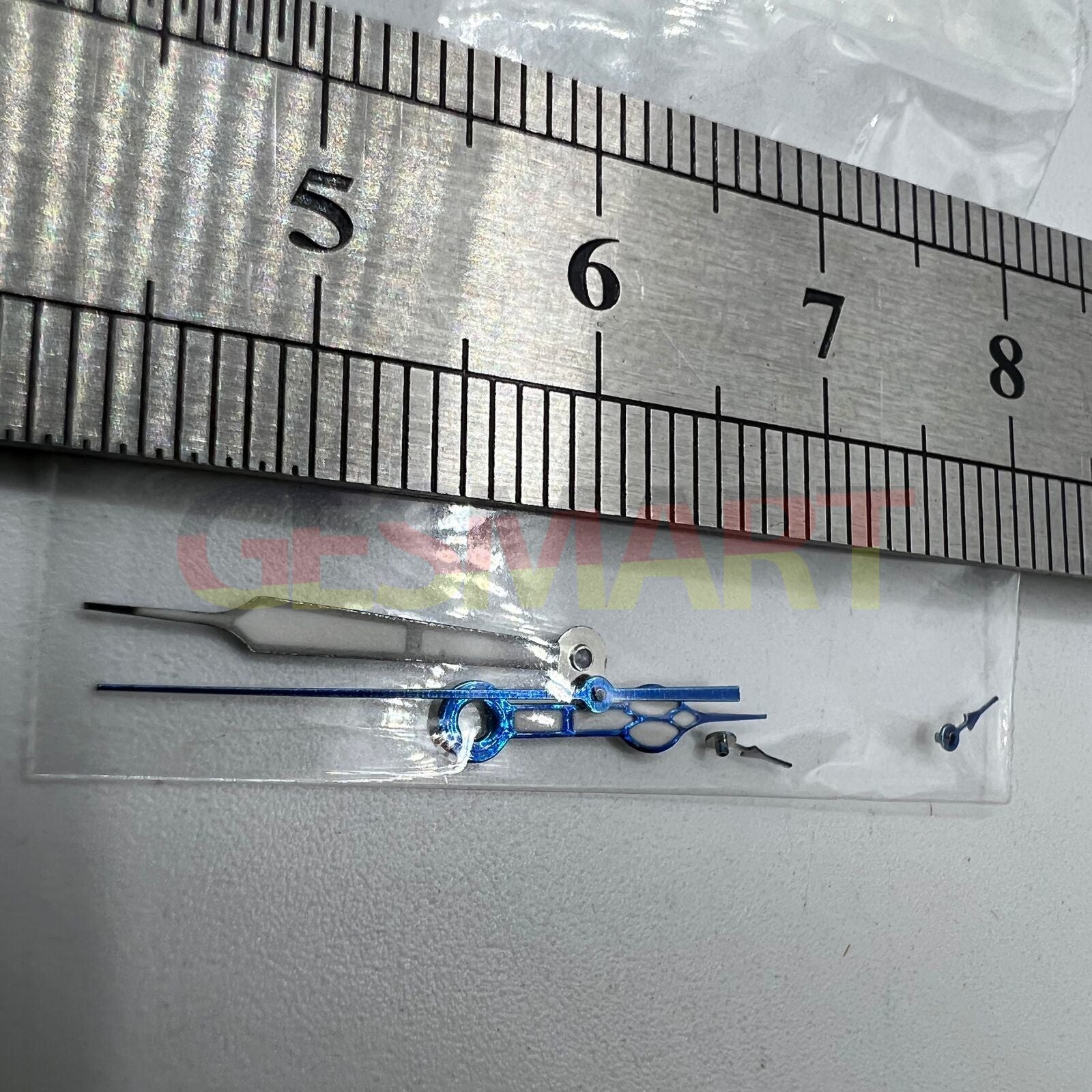 Blue-trimmed green lume watch hands by Miyota for OS10 movement, boosting visibility and style.