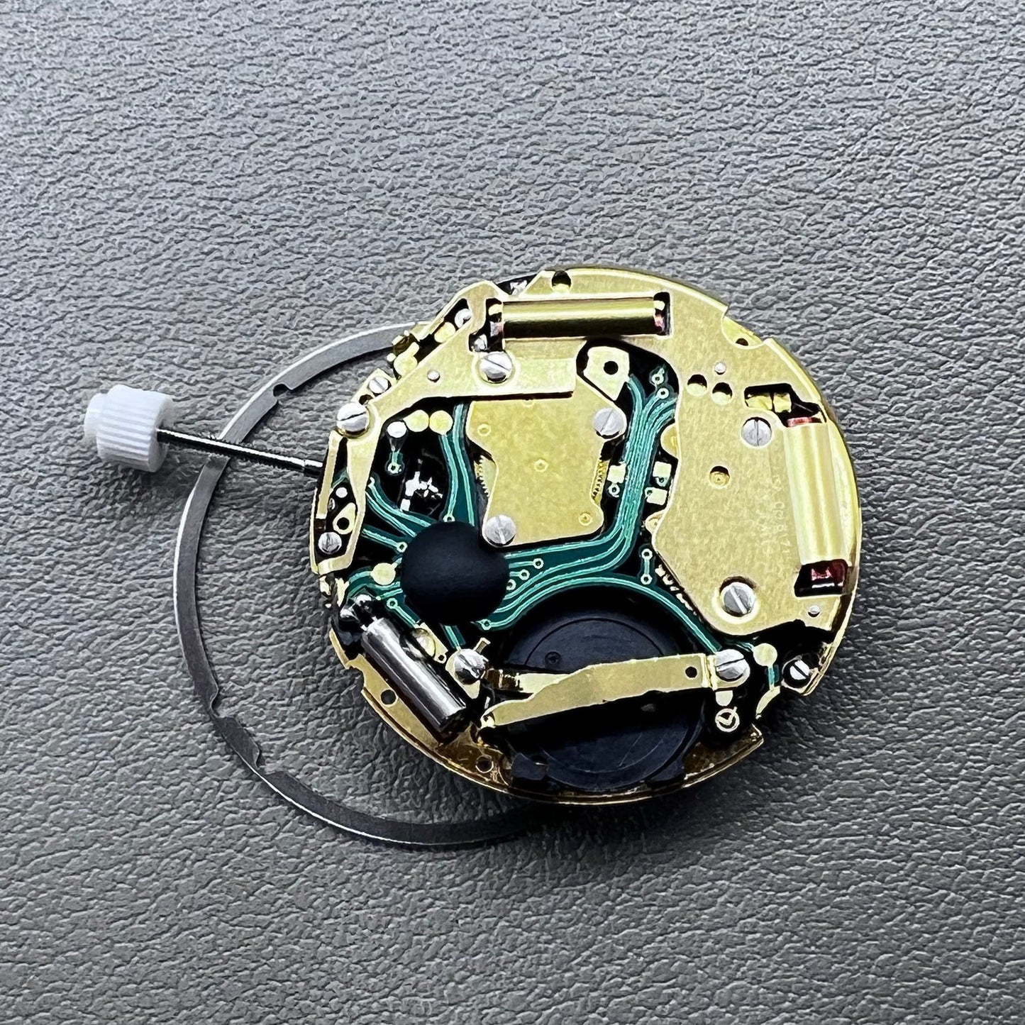 Swiss ISA 8171 golden quartz watch movement with date at 4 o'clock, multi-function design by Swiss ISA.