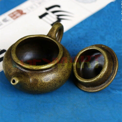 Solid copper teapot trinket, vintage bronze figurine showcasing intricate hand-carved details.