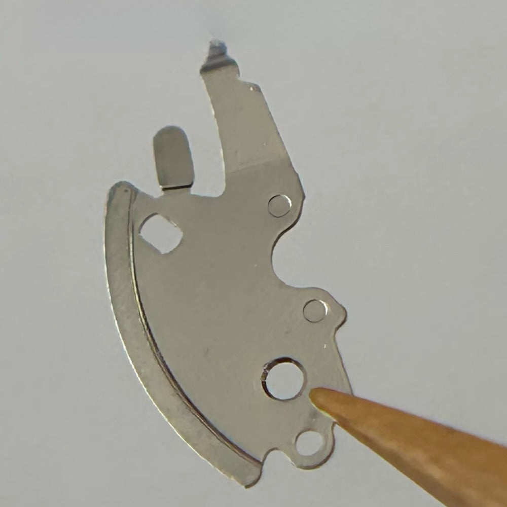 Date Corrector Splint for Swiss ETA2000 watch movement, precise fit for watch repair and maintenance.