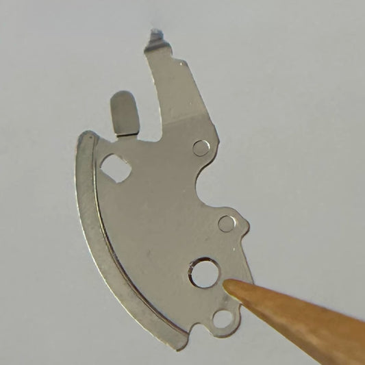 Date Corrector Splint for Swiss ETA2000 watch movement, precise fit for watch repair and maintenance.