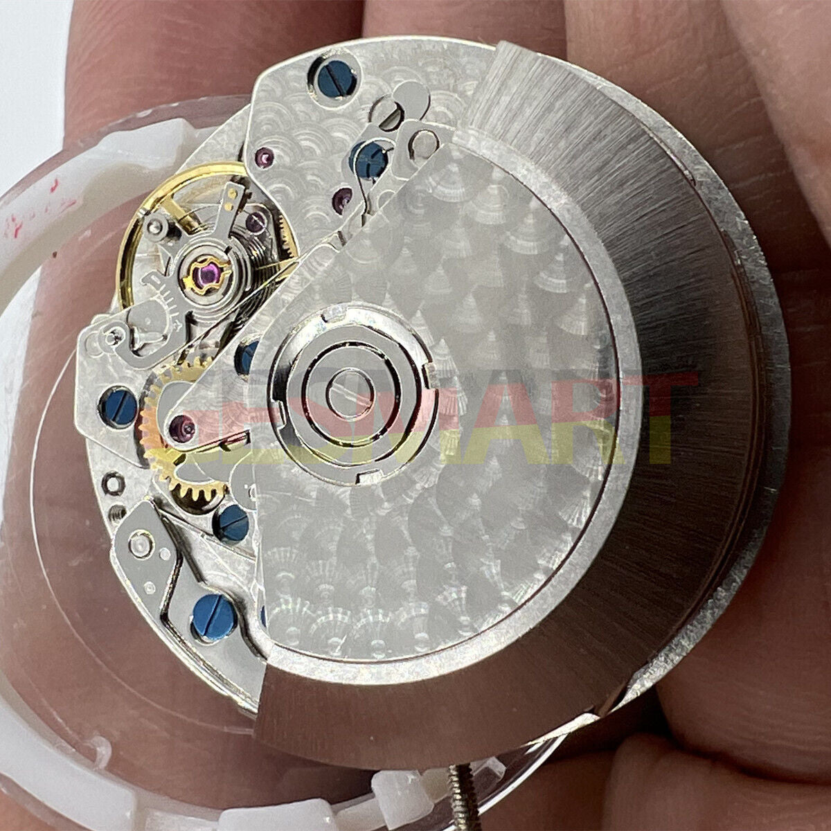 Black Dandong 7753 automatic watch movement with small second at 9, precision mechanical by China Made for watch repairs.