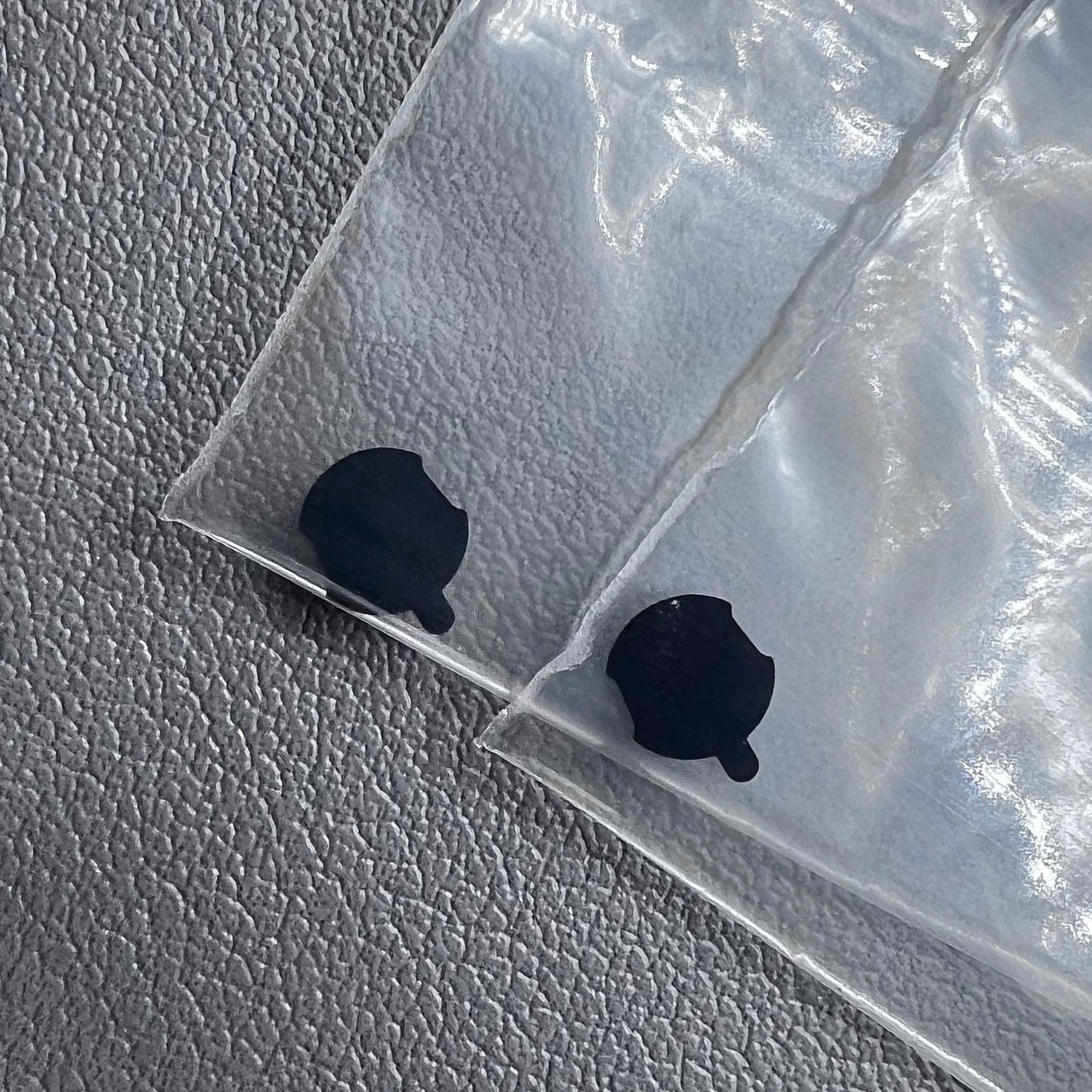 Set of 2 electronic insulation sheets designed for Omega 1456 watch movement, ensuring protection and durability.