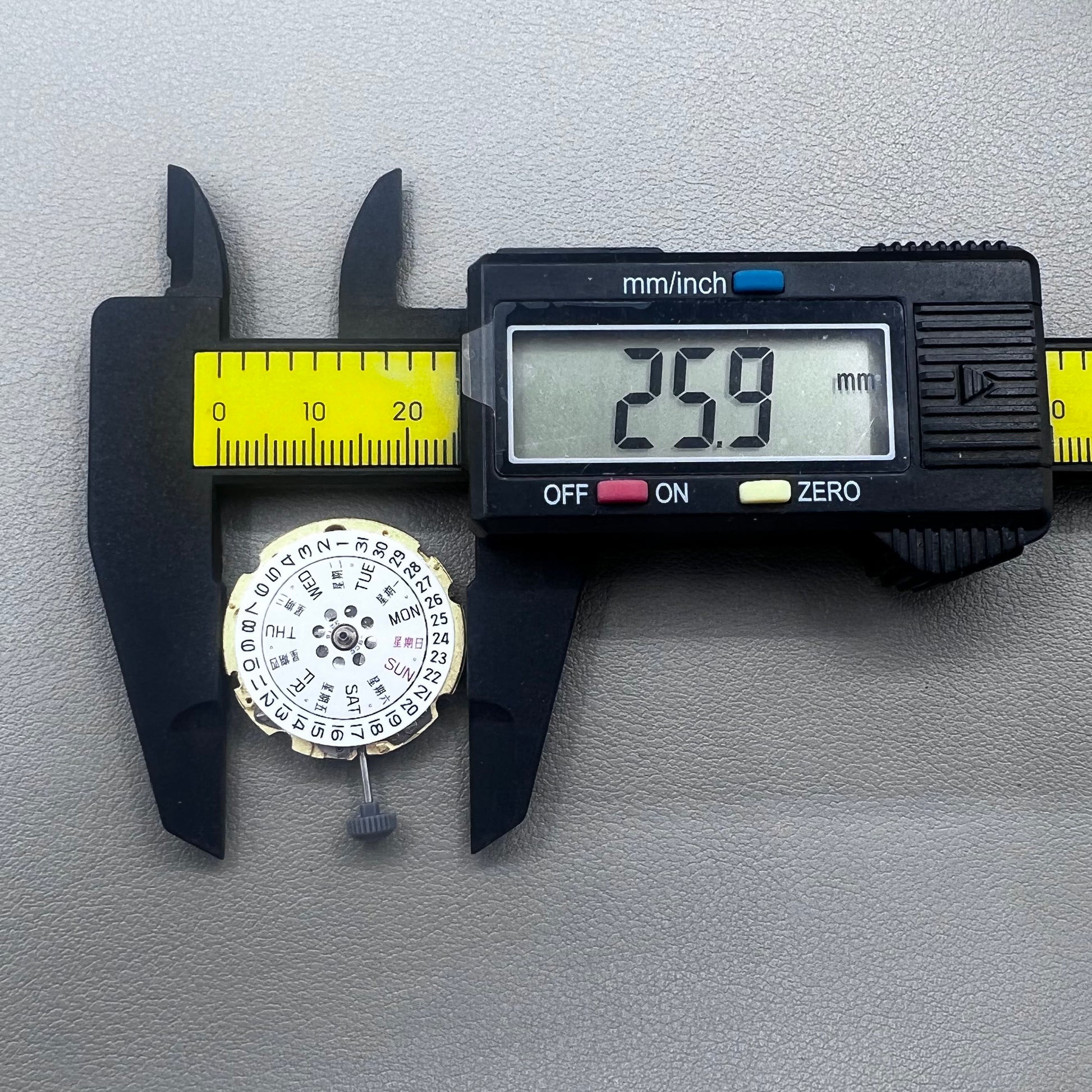 Golden plated Japan Miyota 8205 automatic mechanical watch movement, precision timekeeping component.