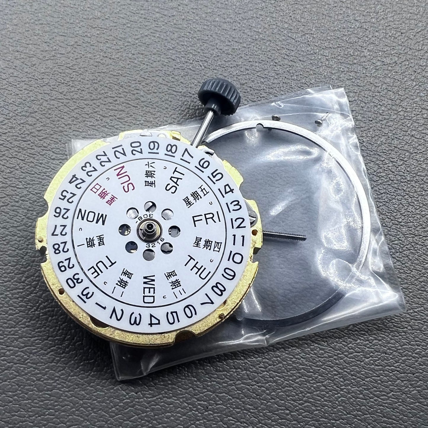 Golden plated Japan Miyota 8205 automatic mechanical watch movement, precision timekeeping component.