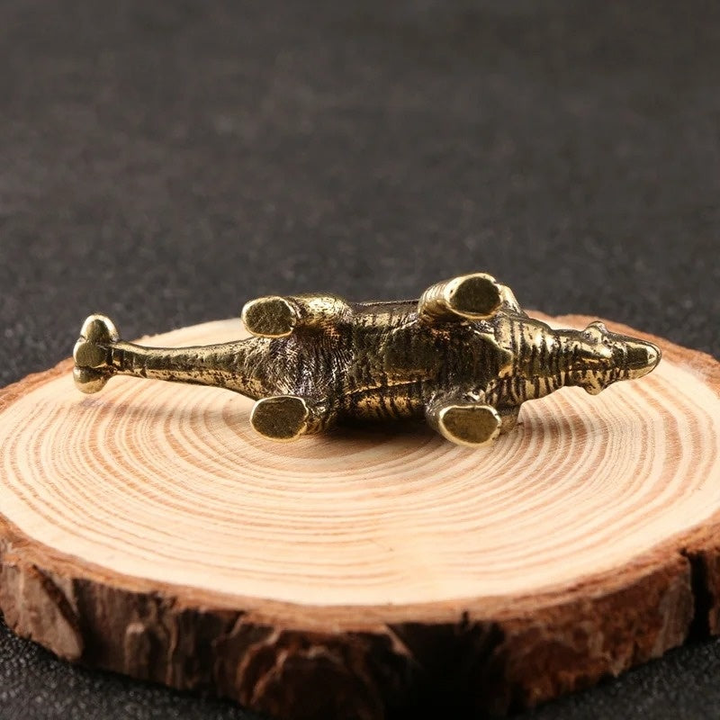 Hand-carved vintage bronze Ankylosaurus trinket by Jurassic Dinosaur, solid copper collectible figurine.