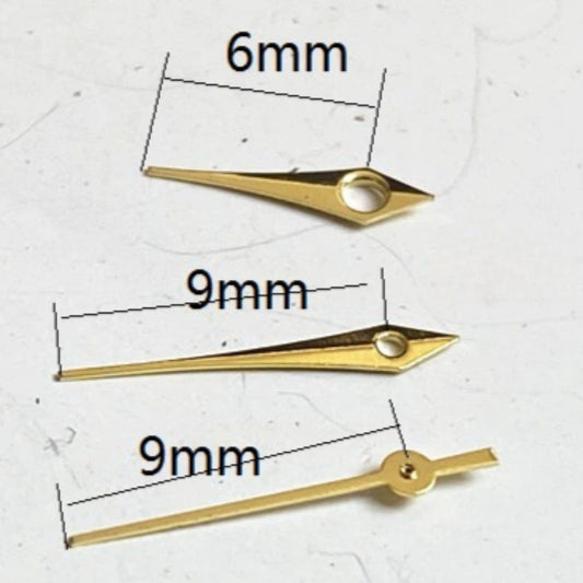 Golden arrow-shaped watch hands, 9x9x6mm, compatible with Miyota 2035 quartz movement, perfect for precise timekeeping.