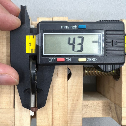 Swiss Ronda 517 quartz watch movement with day and date display at 6 o'clock, precise timekeeping.