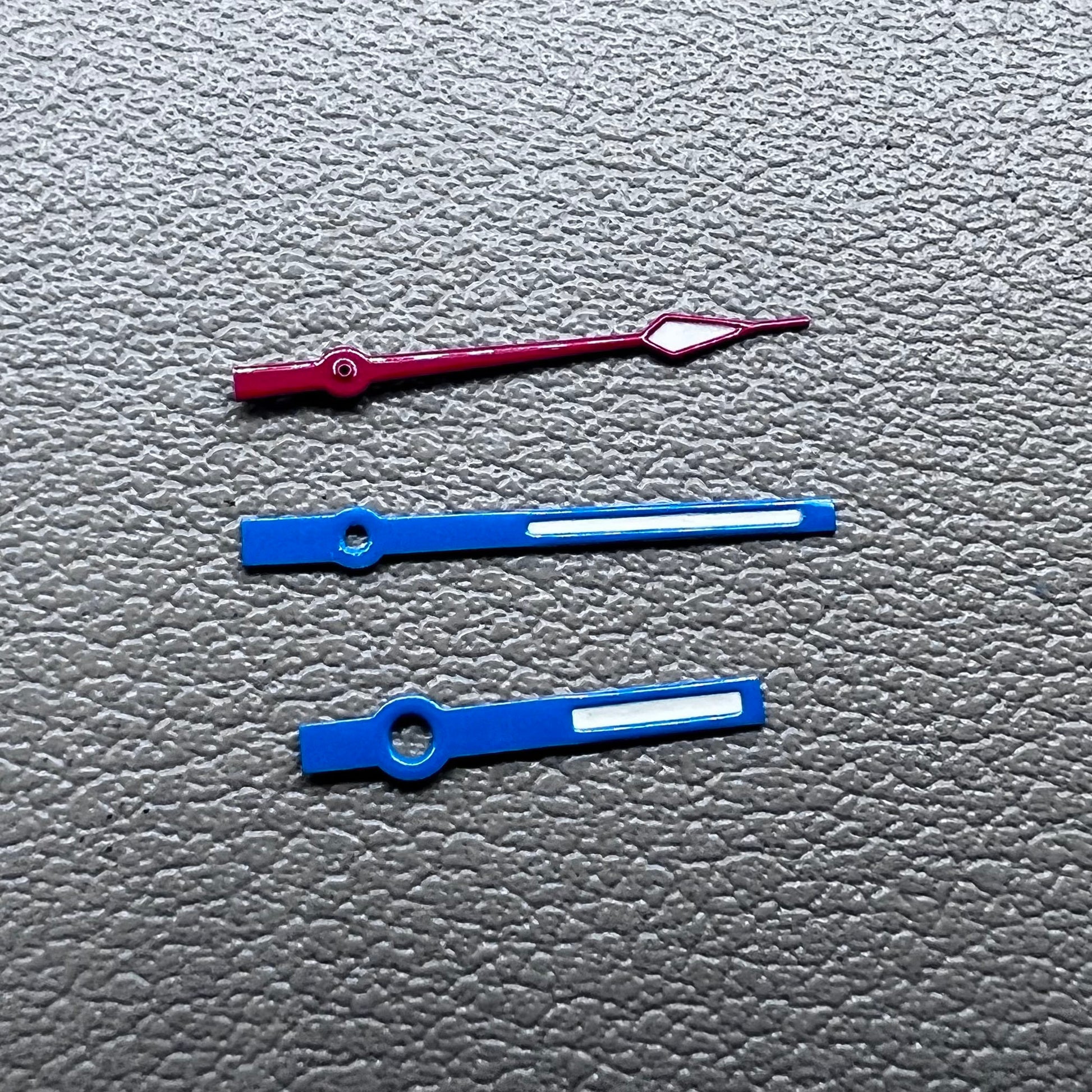 Blue and red trimmed 14mm watch hands with green lume for Ronda 515