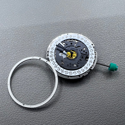 Swiss ISA 8172 silver plated quartz watch movement with stem, precise timekeeping for watch repair and assembly.