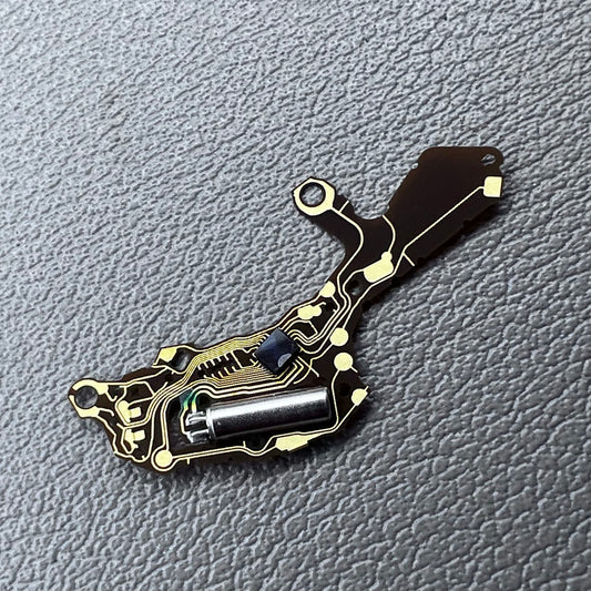 Hattori VR33 quartz movement circuit board for precise watch accessory repair and replacement.