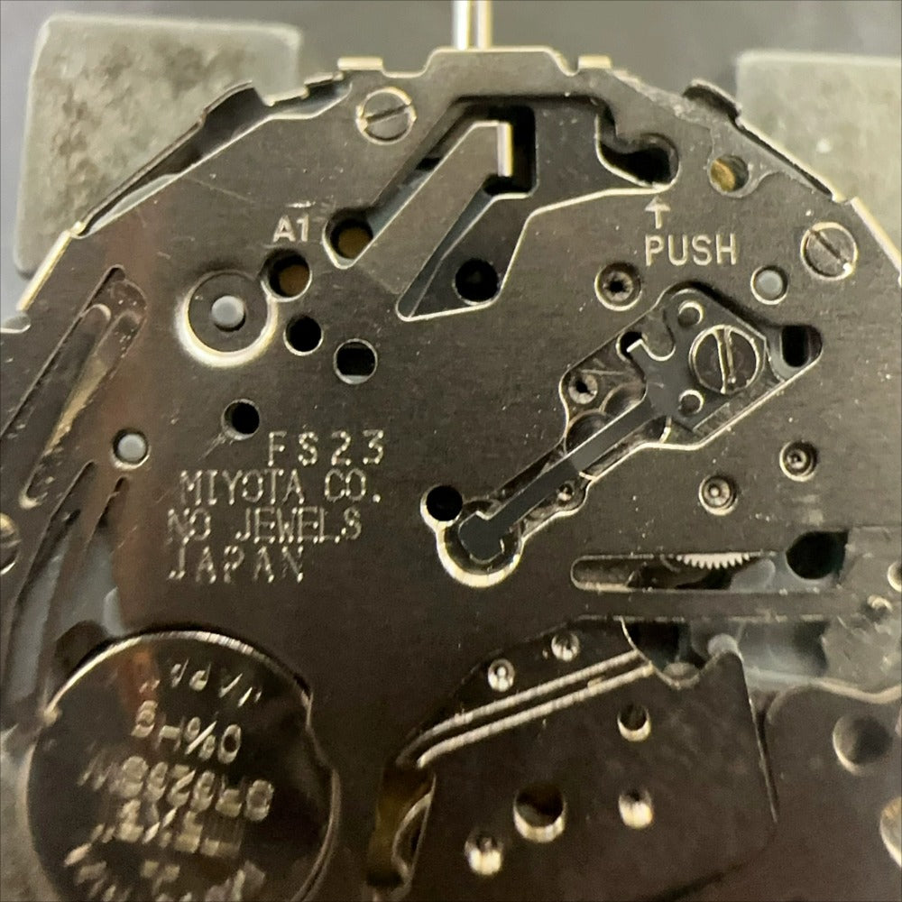 Miyota FS23 quartz watch movement with date display at 3 o'clock, Japan made, precise timekeeping by Miyota.