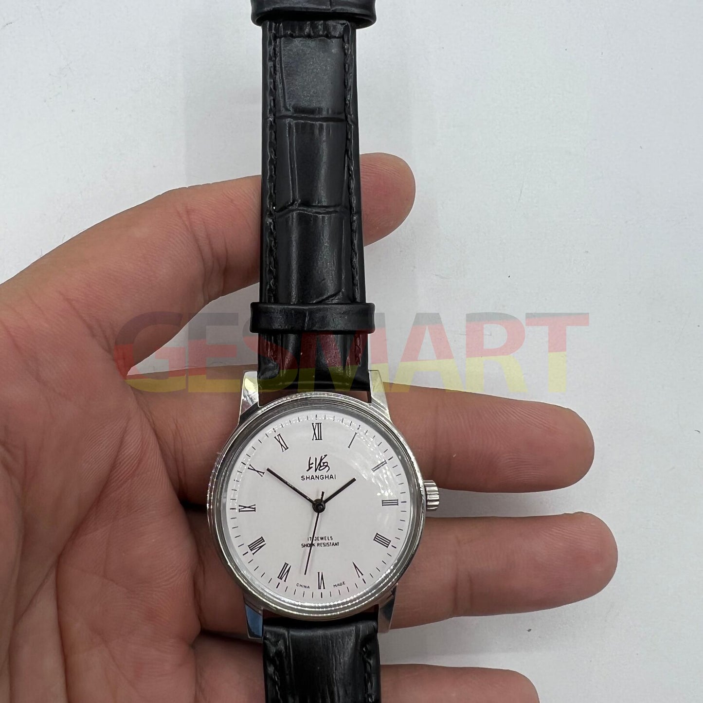 Shanghai Factory 36mm manual mechanical watch with 17 jewels and shock resistance, classic style for daily wear.