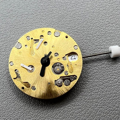 Swiss ISA 9232 quartz watch movement with six hands, date at 3, small seconds at 6/9/12, precision timekeeping.