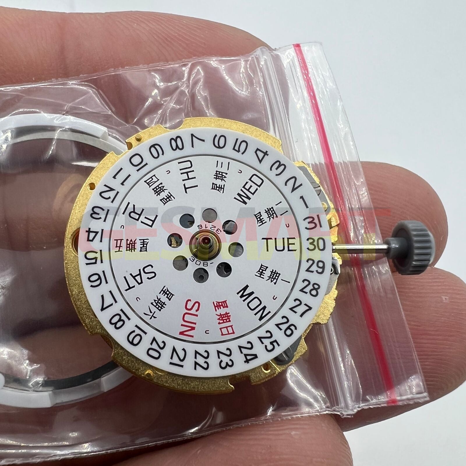 Golden Miyota Citizen 8200 series automatic mechanical movement displaying day and date functions.