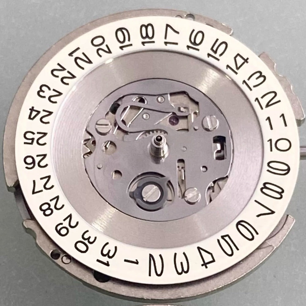 NH15 automatic watch movement by New Japan Made, showcasing precise single calendar function.