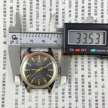 HONGLIAN 32mm manual mechanical watch with black dial, golden markers, and 17 jewels for accuracy