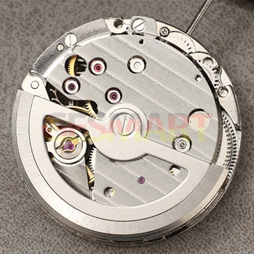 Silver DL8207 automatic balance wheel by Asian DANDONG displaying precise mechanical watch movement details.