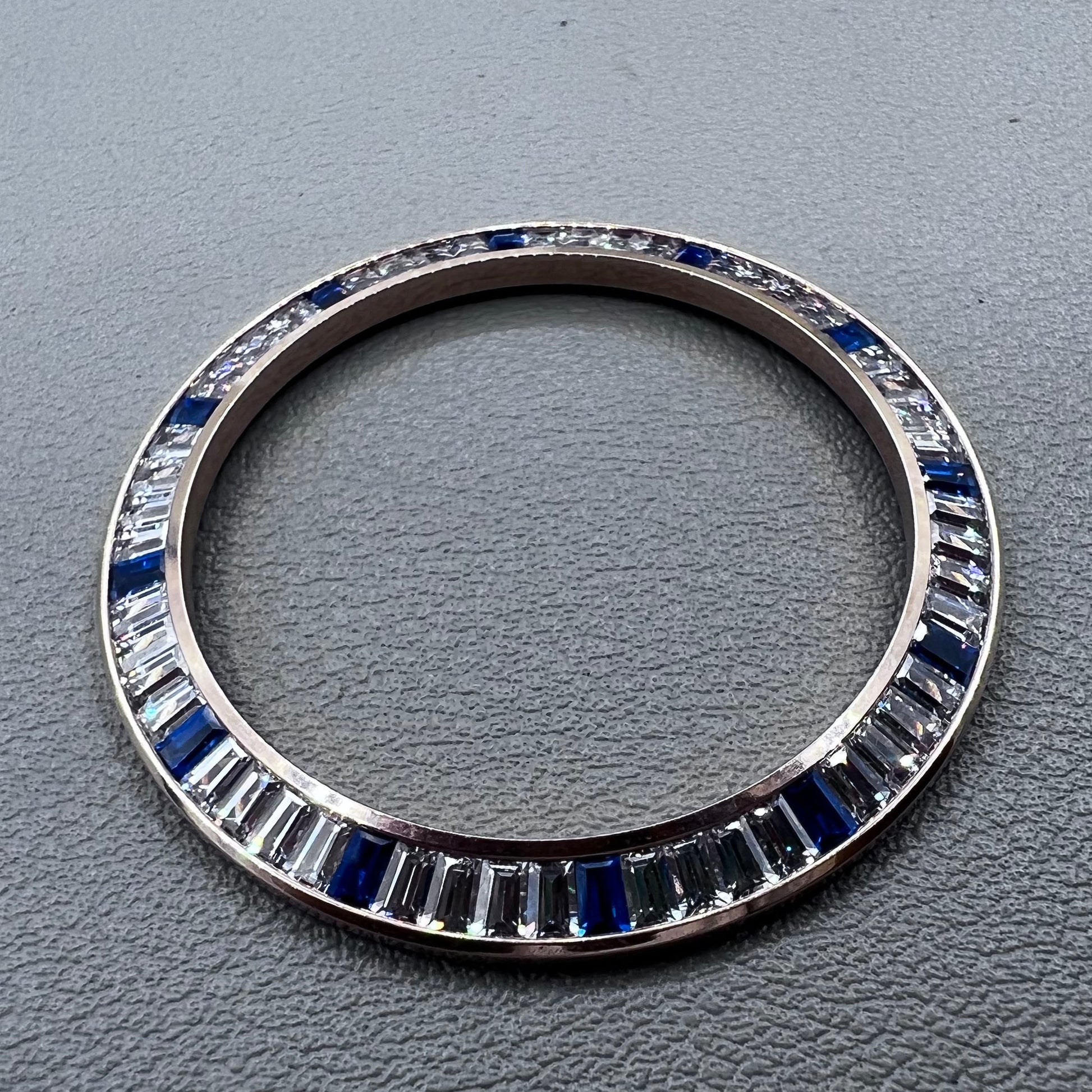 Daytona T-Shaped Square Blue Moissanite watch bezel with rose gold and silver base, elegant accessory