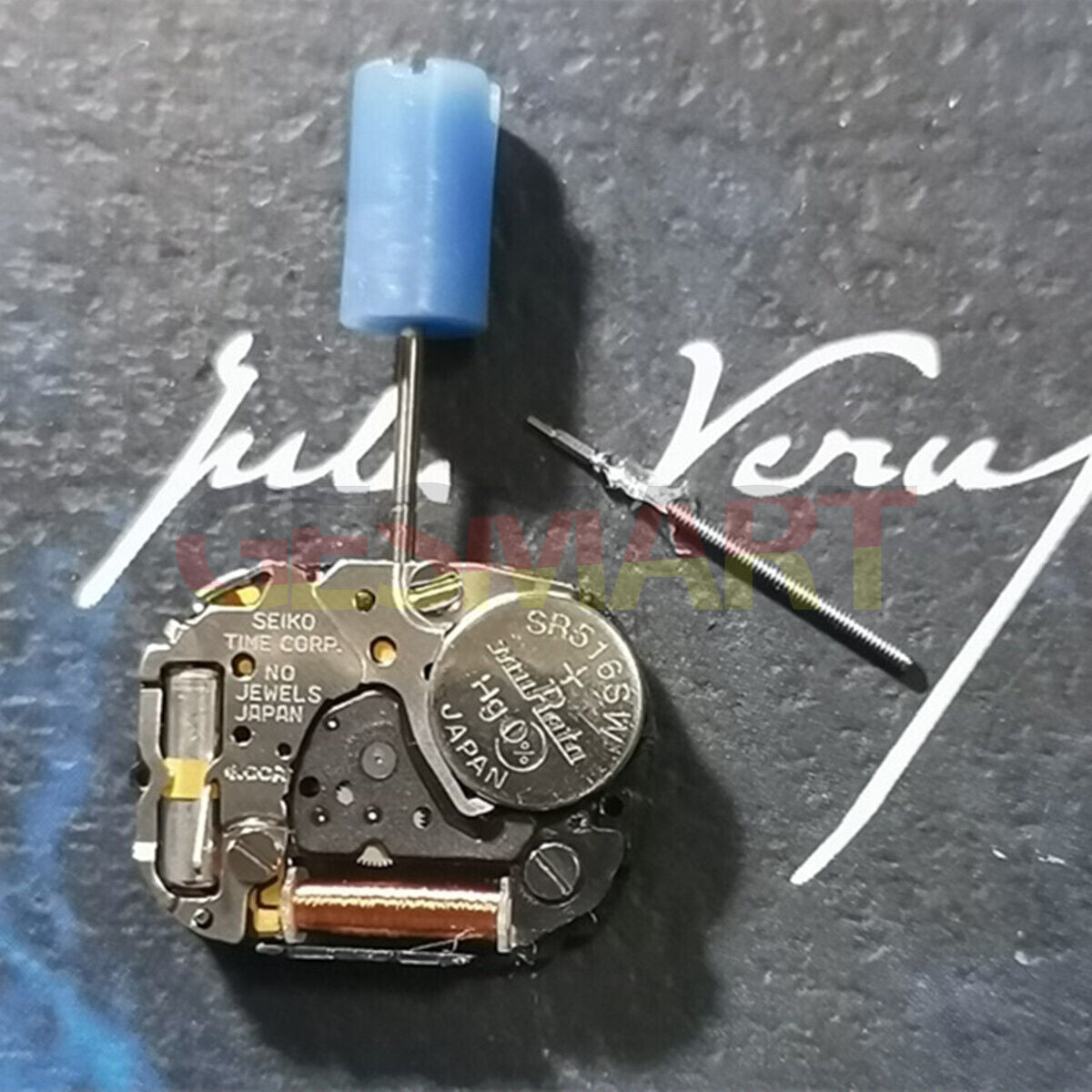Old Stock 1N00A Japanese quartz watch movement with 2 hands, ideal for precise repairs and replacements.