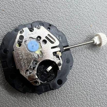 1. Sunon PE46 quartz watch movement with 2 hands and date at 6 o'clock, ideal for repairs.  