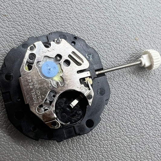 1. Sunon PE46 quartz watch movement with 2 hands and date at 6 o'clock, ideal for repairs.  