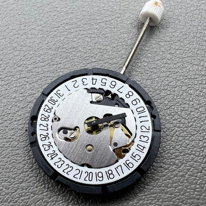 Swiss ISA 338 quartz watch movement with date at 6 o'clock and three hands, ideal for watch accessories.