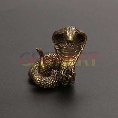 Solid copper cobra trinket, vintage hand-carved detailed snake sculpture for watch accessory display.