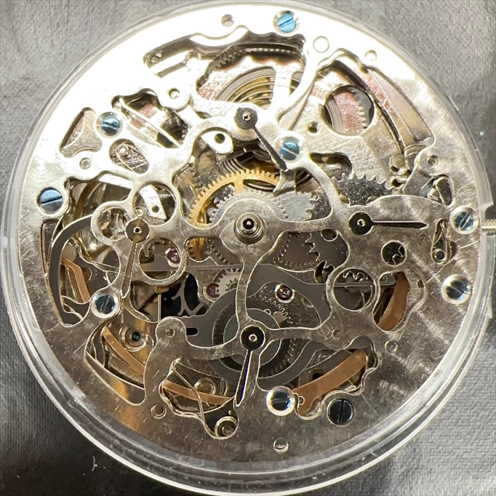 Silver hollow watch part with Hangzhou 2189 automatic movement, China-made for precise mechanical repair.