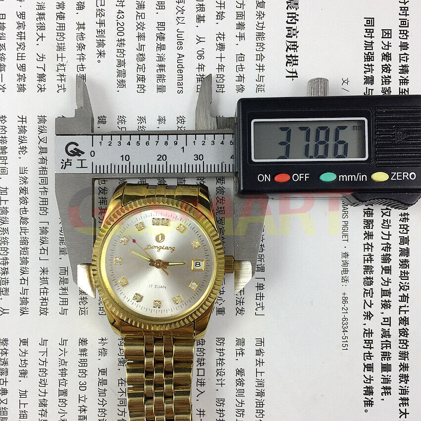 Donglang 36mm manual mechanical watch with silver dial, 17 jewels, single calendar display.