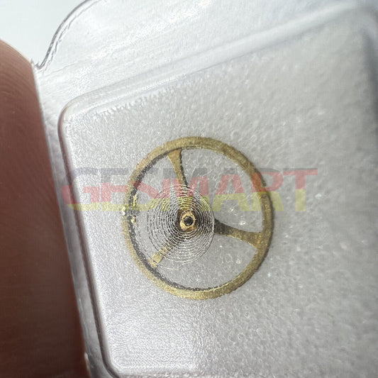 Golden balance wheel with hairspring for Movement 2189 watch repair. Precise fit spare part.
