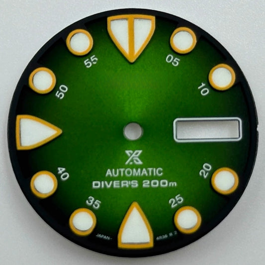 Green luminous watch dial with yellow trim, 28.5mm size, compatible with NH36, perfect for diving watches.