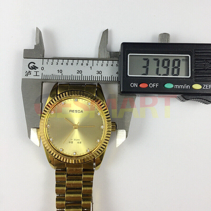Manual mechanical watch with 17 jewels and golden dial, classic style by China Made, featuring imitation diamond markers.