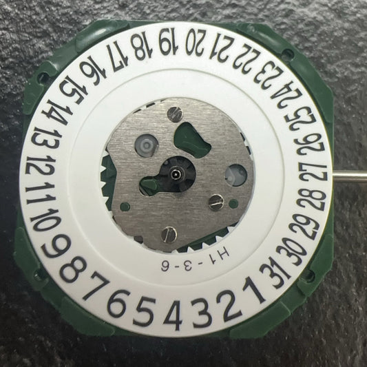 Miyota 2317 quartz watch movement with date at 6, Japan made for precise men's watch repair.