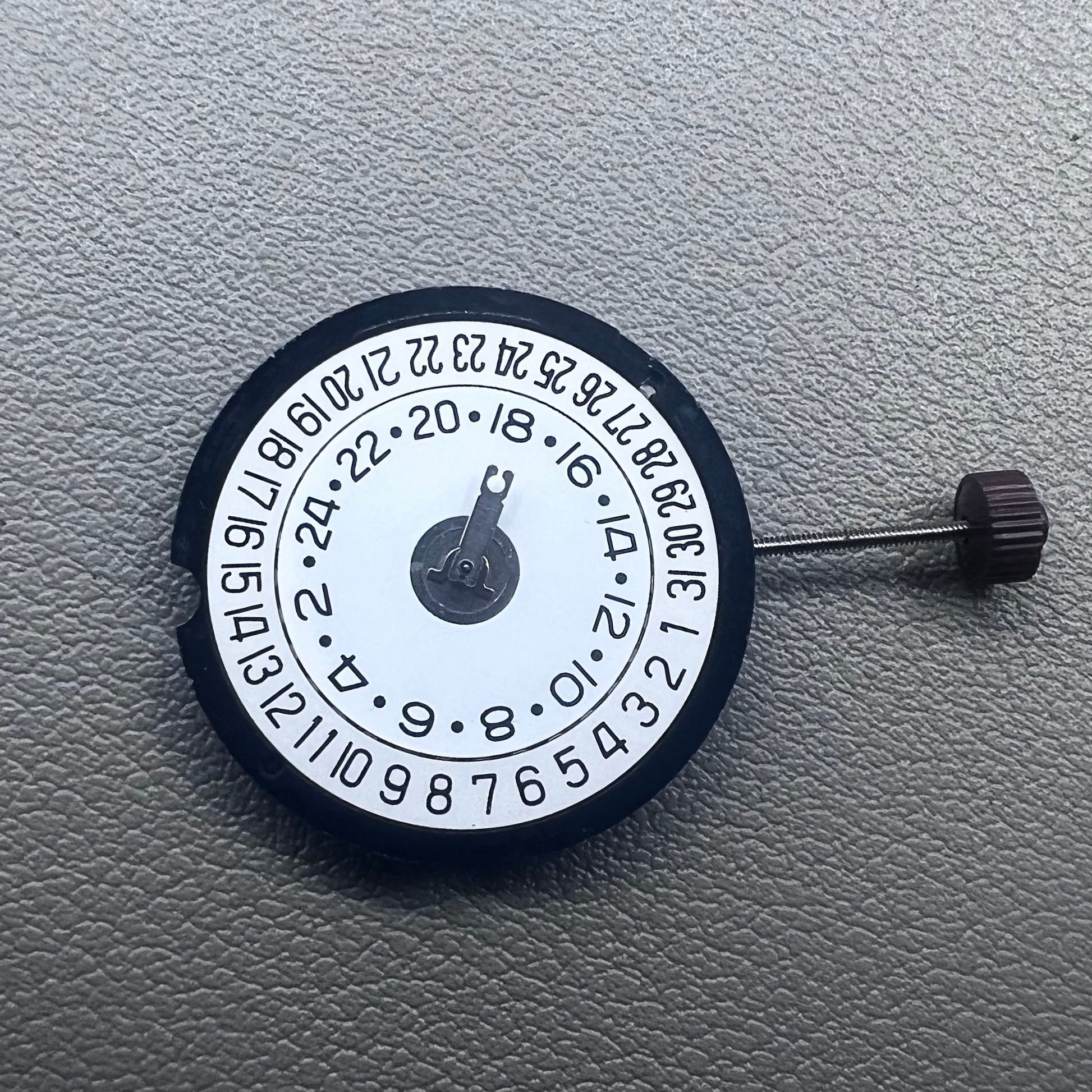 Swiss Ronda 505 24D quartz watch movement with date at 6 o'clock, precision timekeeping for accessories.