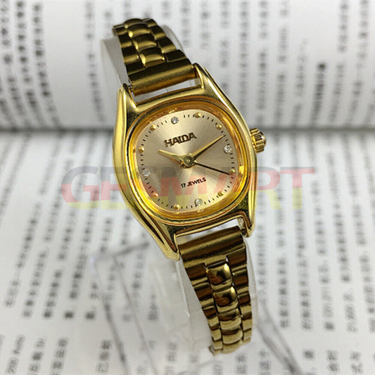 HAIDA Manual Mechanical Lady Watch with golden nail accents, 17 jewels, champagne dial, and square case for elegant wear.