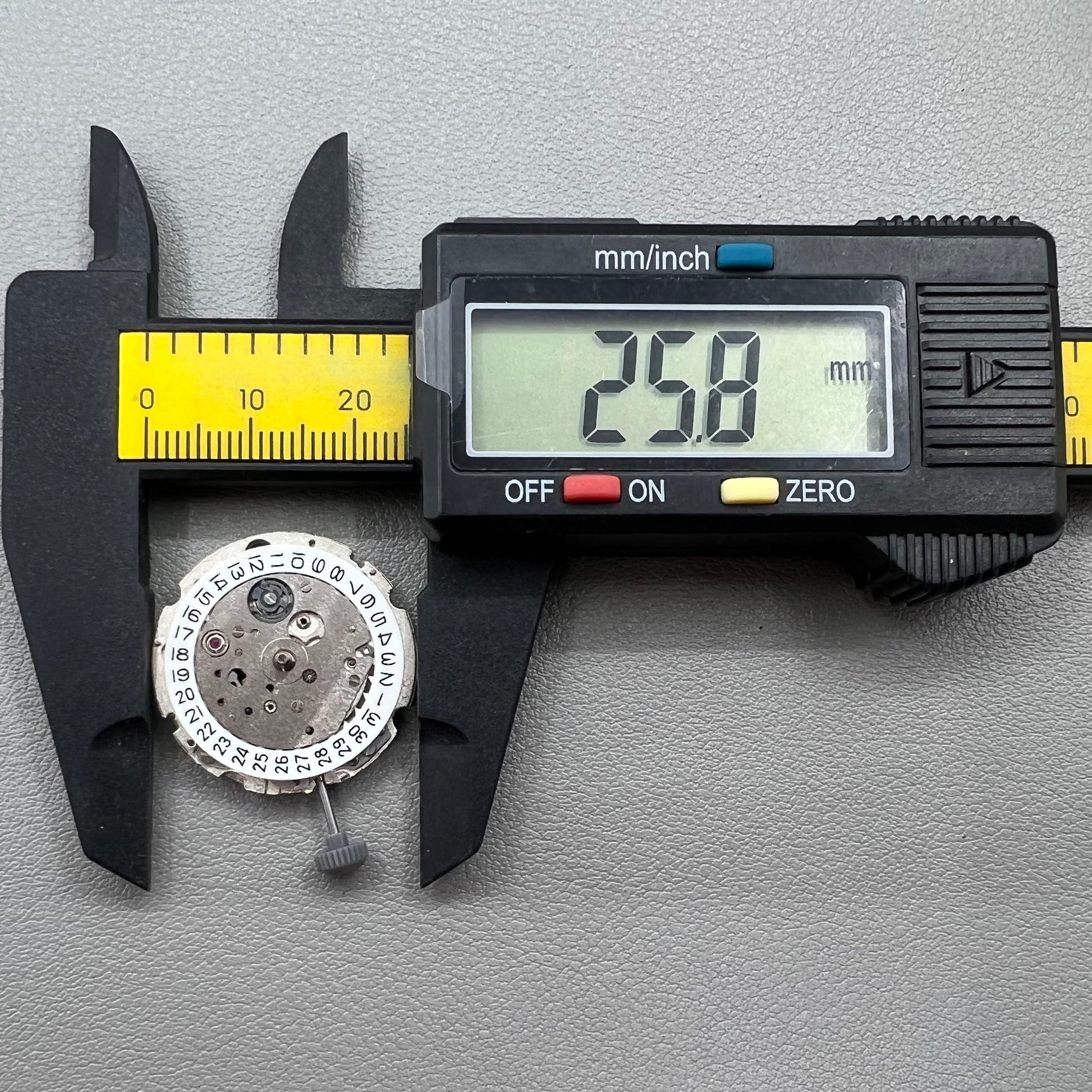 Japan Miyota 8218 automatic watch movement with date at 9 o'clock and two hands, precision timekeeping.