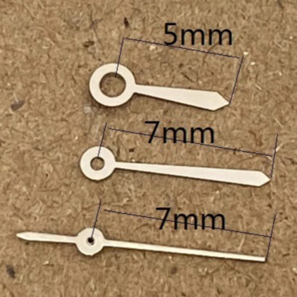 Silver 7x7x5mm watch hands for Ronda 785 movement, precise fit for watch repair and customization.