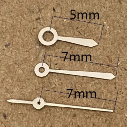 Silver 7x7x5mm watch hands for Ronda 785 movement, precise fit for watch repair and customization.