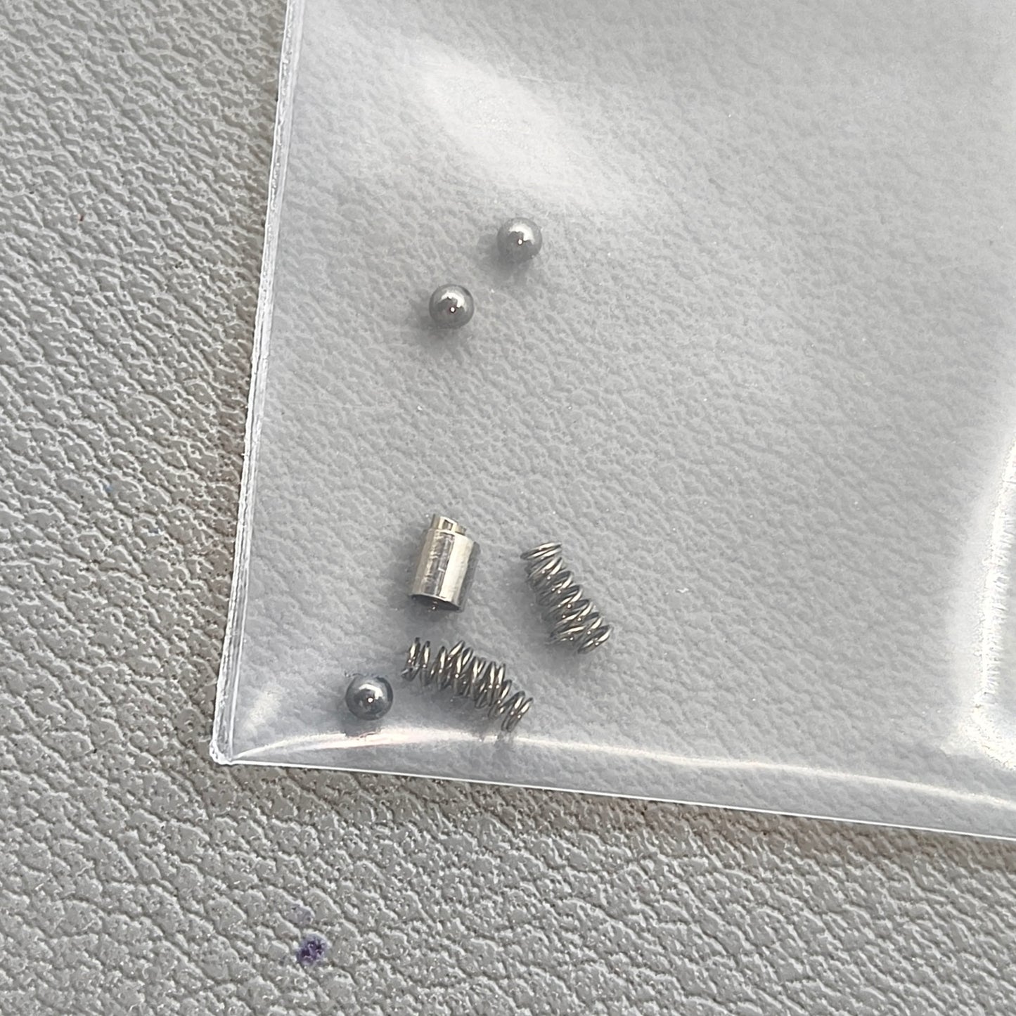 A Set of Watch Bezel Inner Case Spring Rotating Steel Ball Spring Ball for RLX SUB