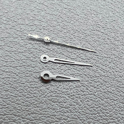 Hollow silver trim watch hands set for NH05 NH06 movement, compatible with watch repairs and customization.