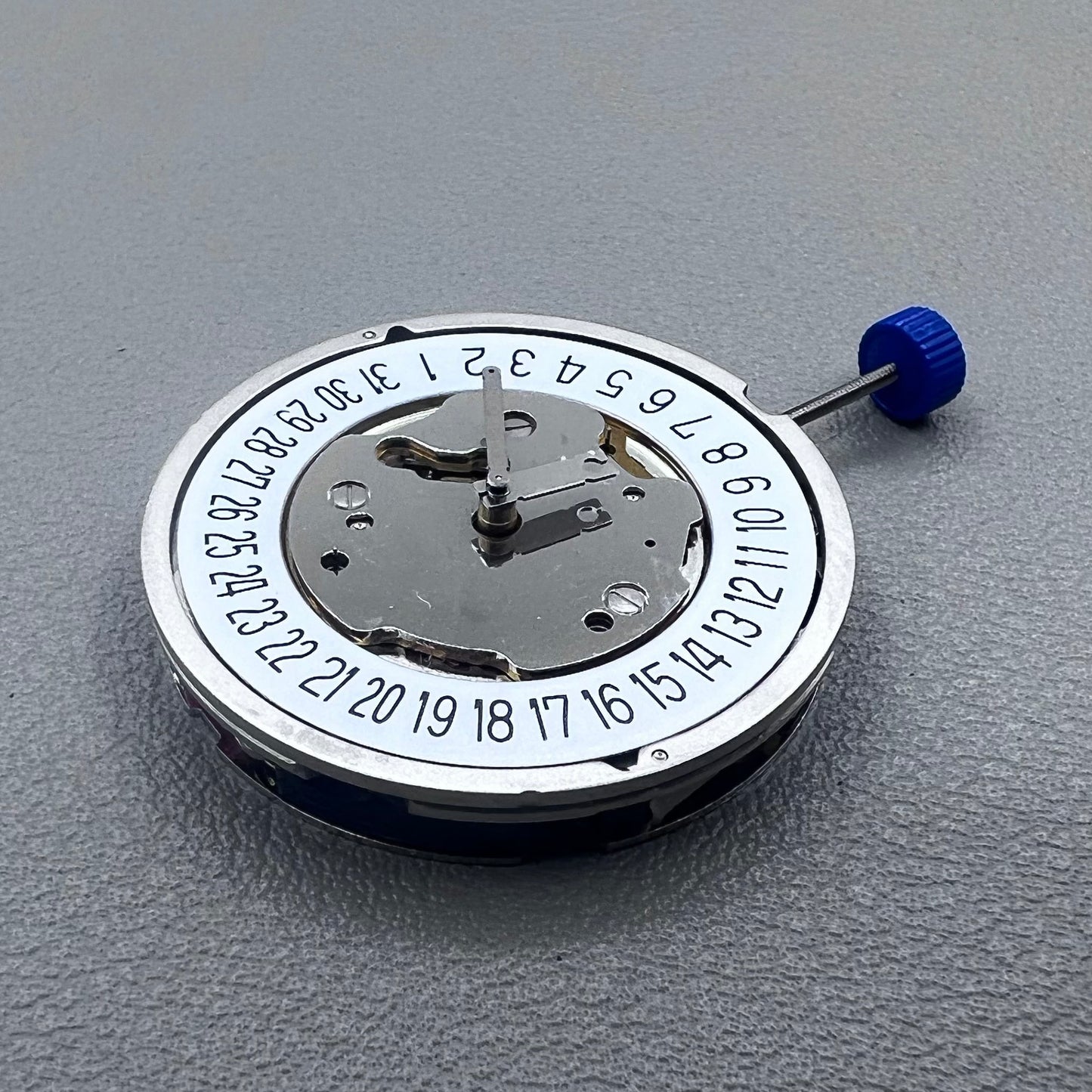 Swiss Ronda 5021D quartz movement with date display at 6 o'clock, precise watch accessory by Ronda.
