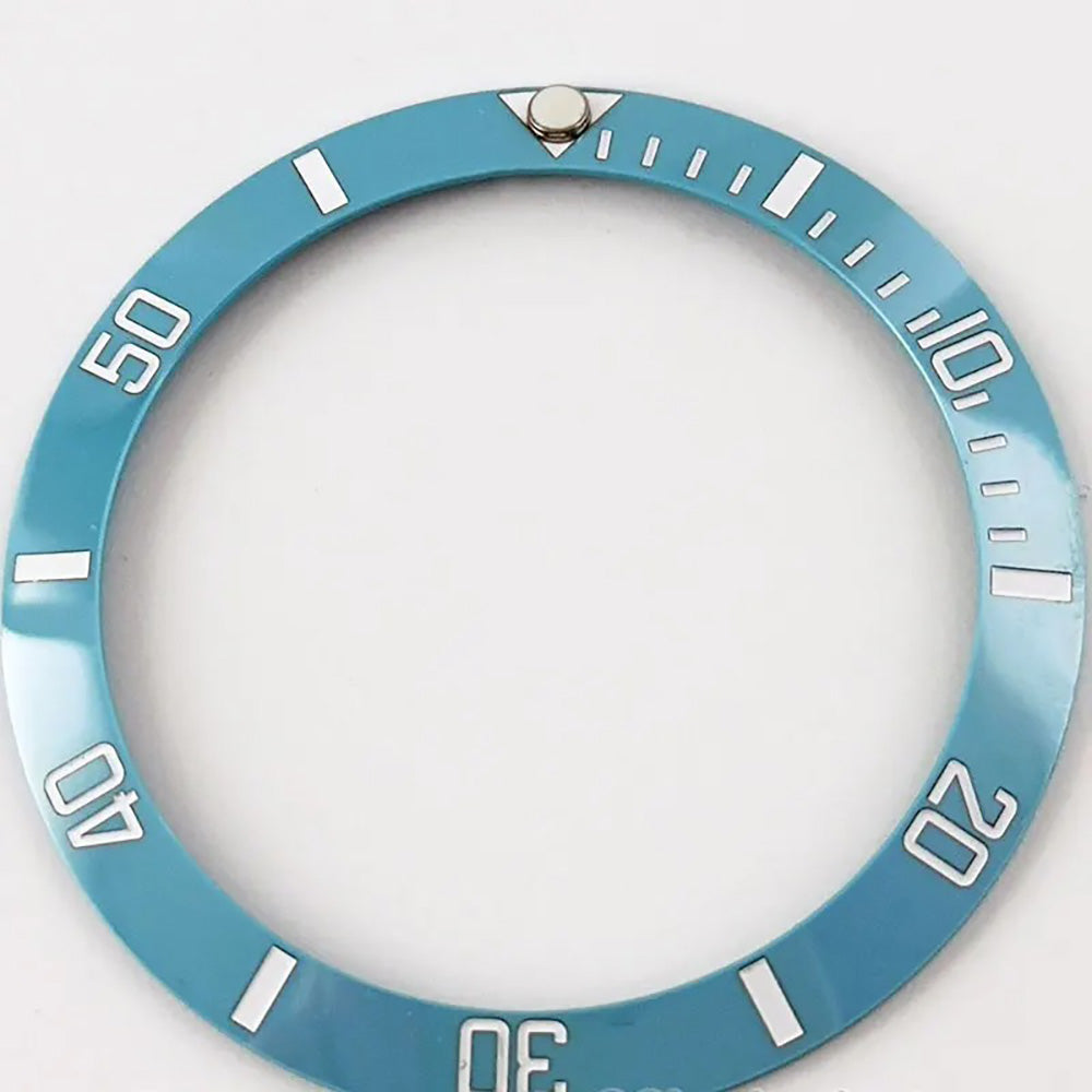 Blue ceramic bezel insert with white Arabic numerals for SUB GMT 38mm diver watch.